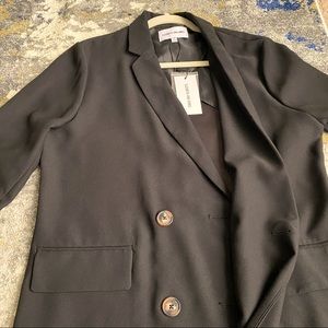 Perfect classic Black mid length blazer.